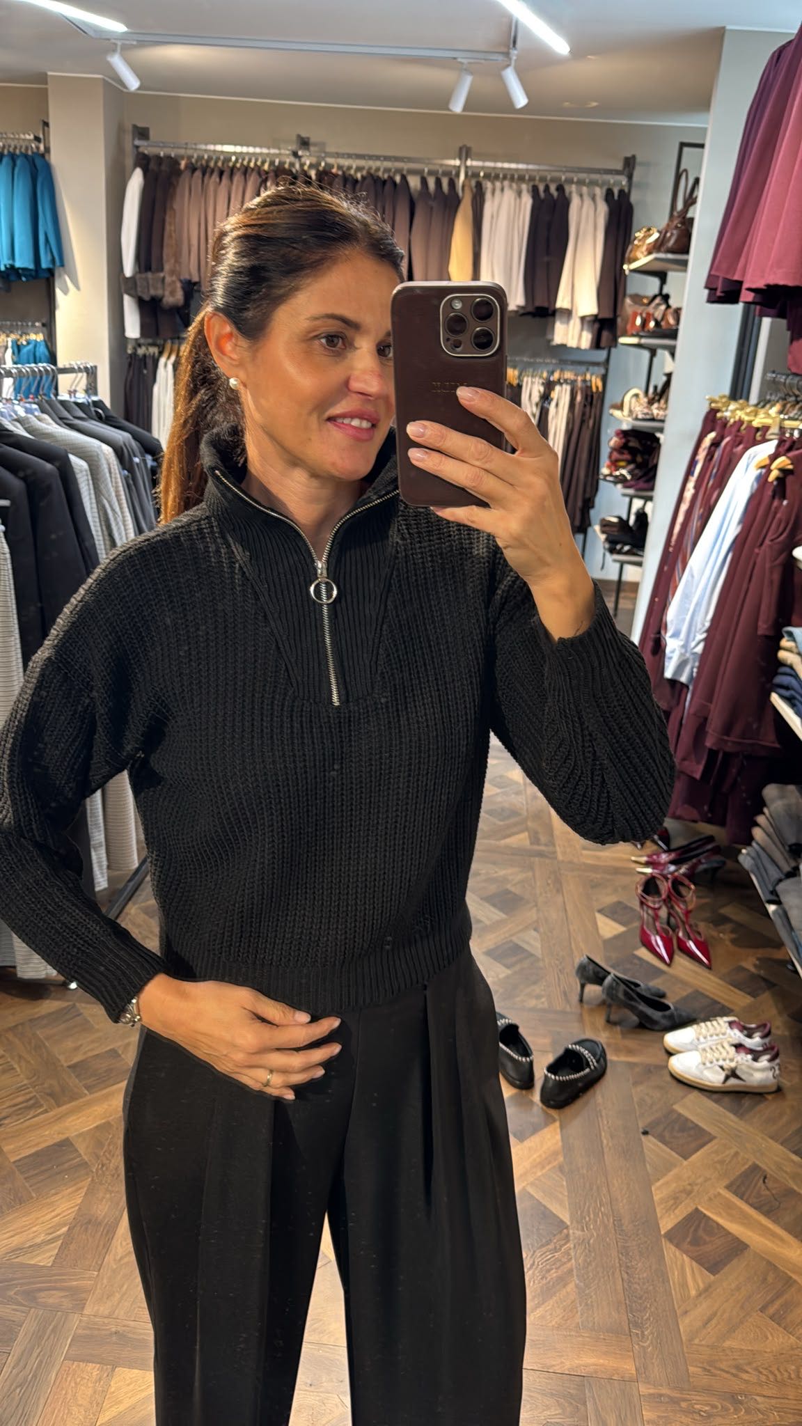 MAGLIONE CON ZIP NERO