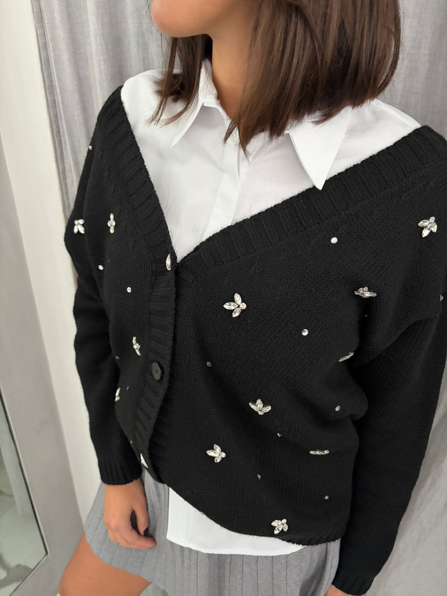 CARDIGAN NERO CASTONI FIOCCO