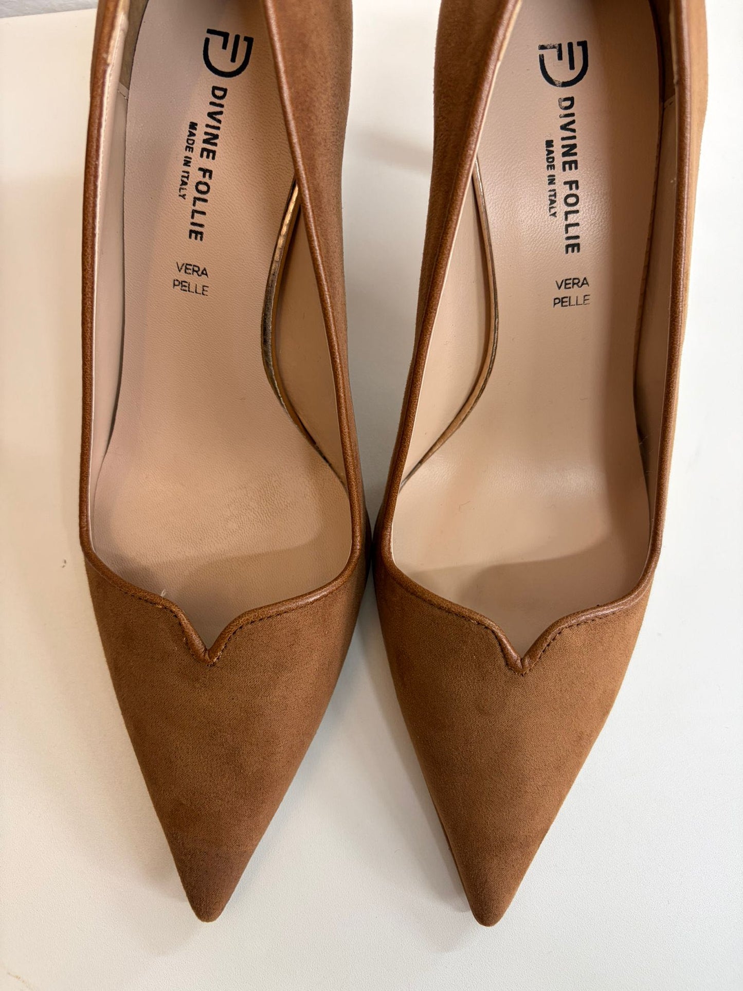 DECOLLETE SCOLLO A CUORE CUOIO