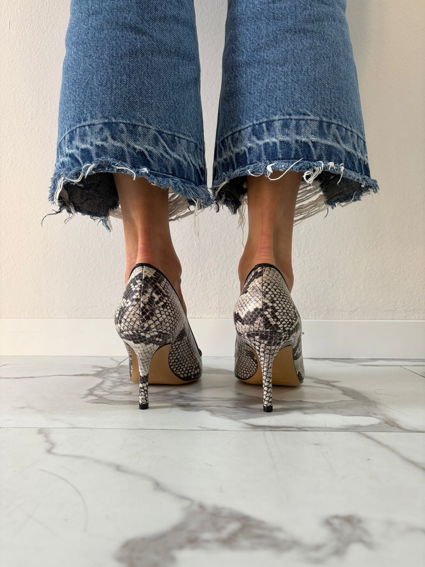 DECOLLETE SCOLLO A CUORE PITONATA
