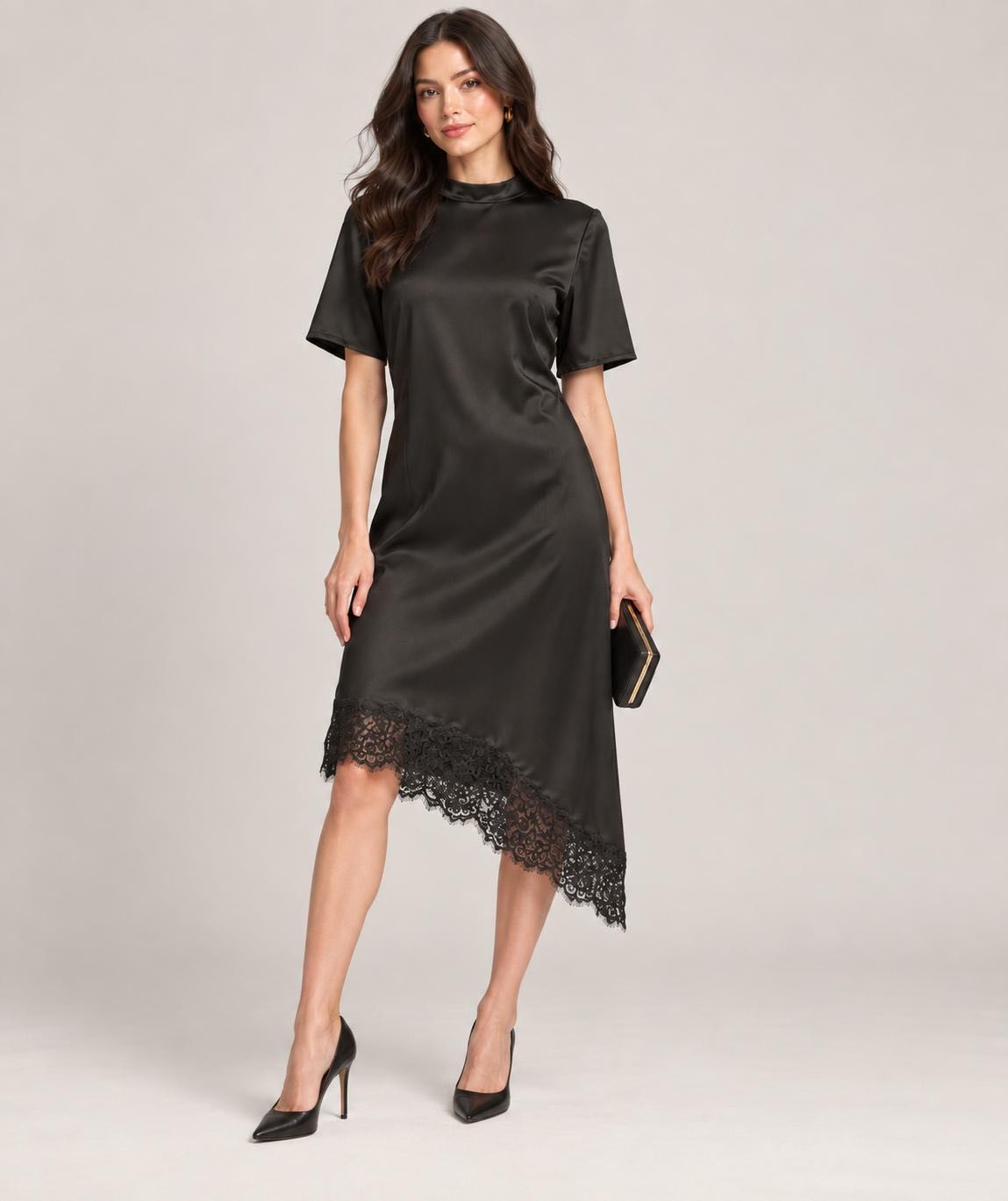 ABITO ASIMMETRICO PIZZO NERO