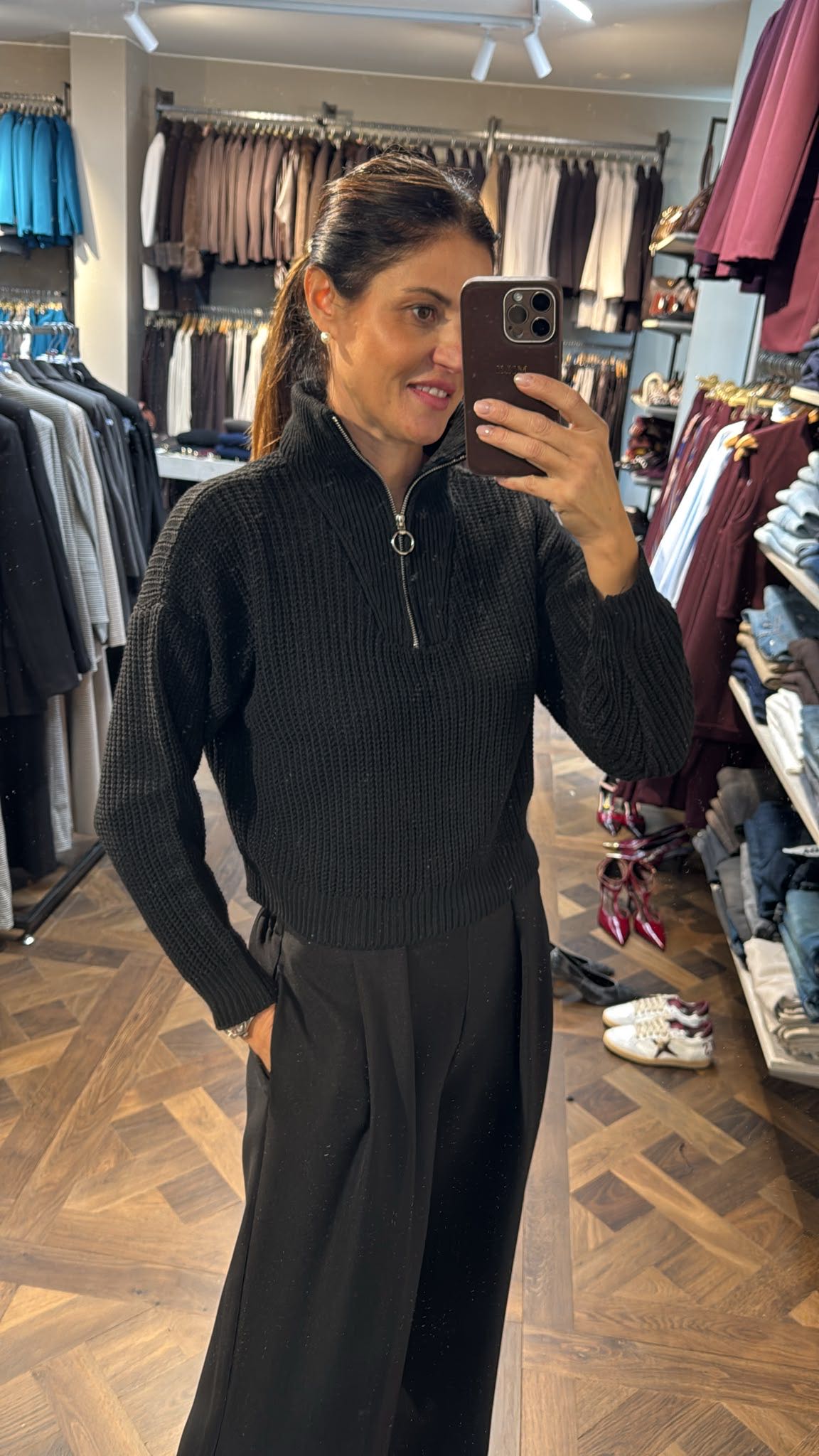 MAGLIONE CON ZIP NERO